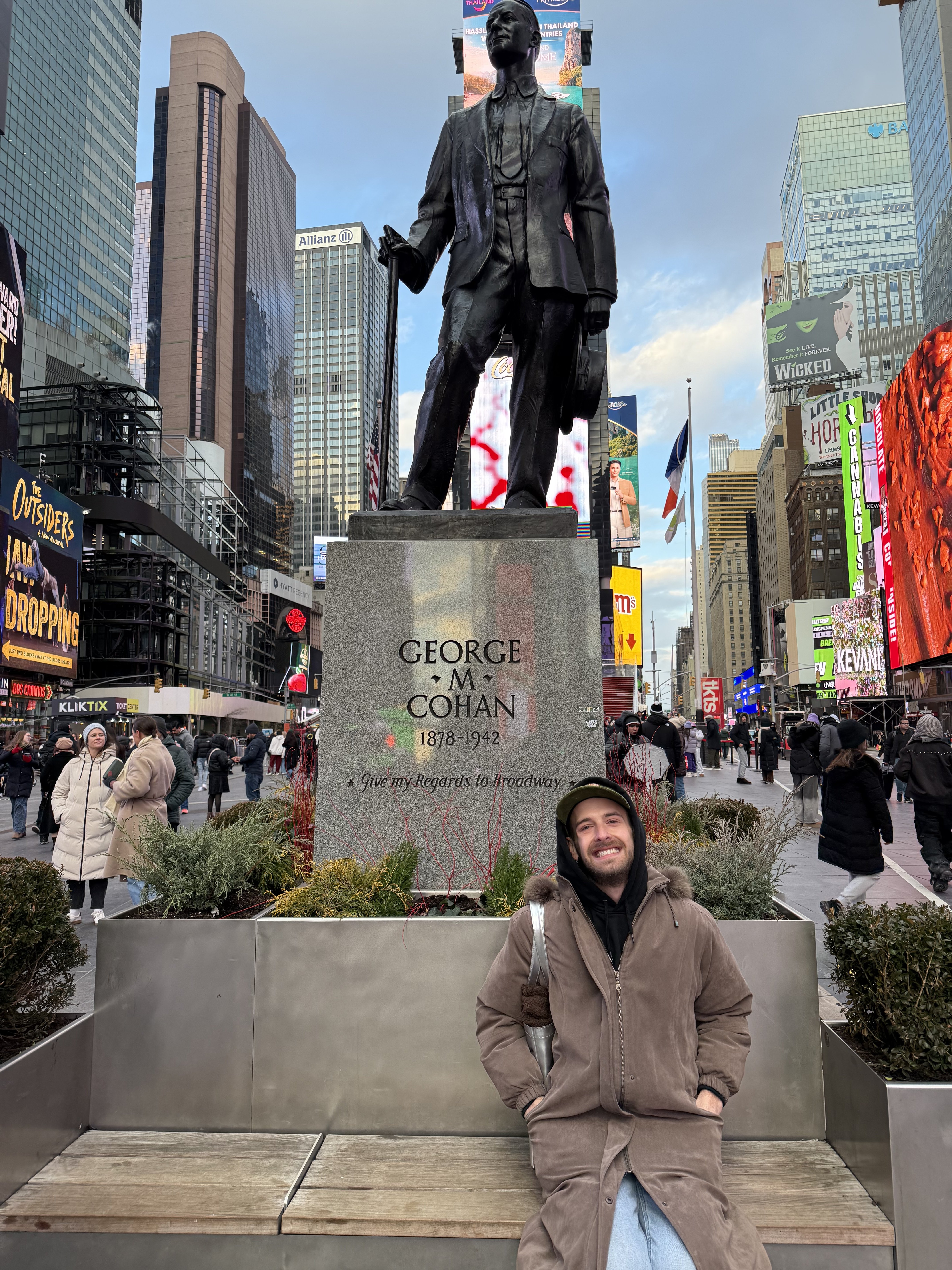 Kable Barnhart at the George M. Cohan statue in Times Square, New York